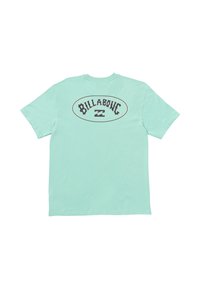 Mint green cotton t-shirt featuring short sleeves, a round neckline, and a large black "Billabong" logo on the back within an oval shape.