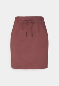 Una falda de mezcla de algodón burdeos con cintura ajustable, que presenta pliegues, una silueta ajustada y un dobladillo justo por encima de la rodilla.