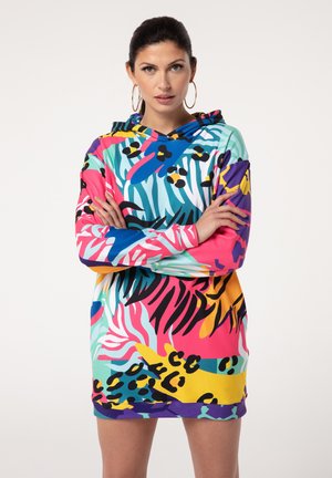 Colorful hooded dress featuring a mix of abstract animal and floral patterns in pink, blue, green, yellow, and purple. Smooth fabric texture.