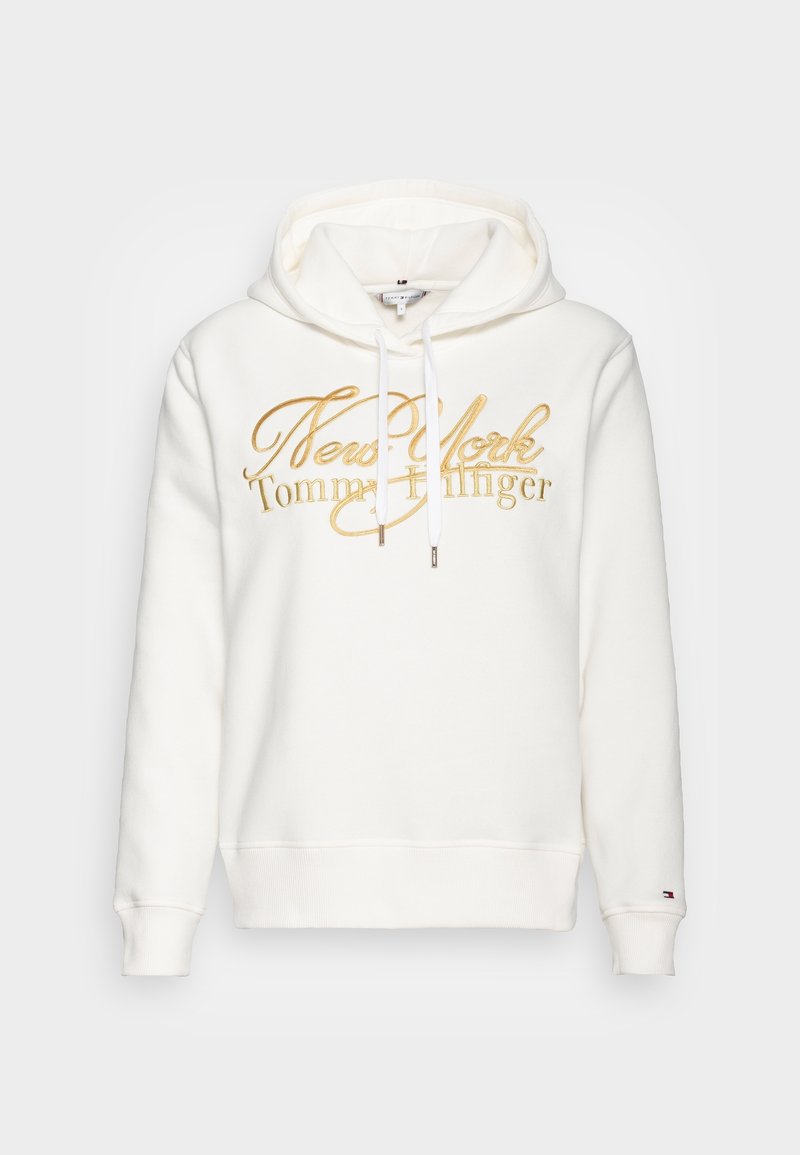 Sudadera blanca hecha de un tejido suave, con un logo bordado en dorado de "New York Tommy Hilfiger" y cordones para la capucha.