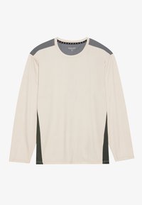 Langsleeve shirt gemaakt van lichtgewicht stof; crème kleur met donkergroene zijpanelen en grijze accenten op de schouders. Ronde halsontwerp.