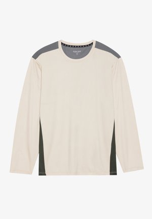 Langarmshirt aus leichtem Stoff; cremefarbig mit dunkelgrünen seitlichen Einsätzen und grauen Akzenten an den Schultern. Rundhalsdesign.