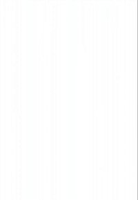 Jovem mulher a usar um headset de VR e um casaco cinzento faz gestos com as mãos numa sala branca e luminosa com janelas.