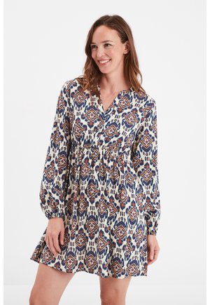Langärmliges, gemustertes Kleid in Creme-, Marine- und Rosttönen. Verfügt über einen V-Ausschnitt, taillierten Bund und einen lockeren, ausgestellt Rock.