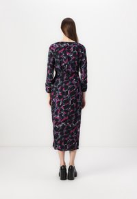 Black floral dress with long sleeves, featuring a colorful pattern of pink and blue petals, fitted waist, and a midi-length hem.