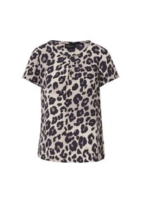 Top à manches courtes en beige clair avec imprimé léopard noir. Il présente un col rond et des détails plissés à l'avant. Tissu doux et lisse.