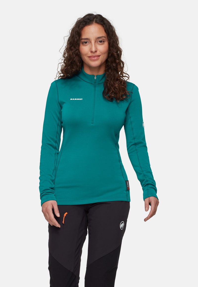 Teal Langarm-Zipper-Oberteil aus hochwertigem Funktionsmaterial, mit kleinem Logo, flachen Nähten und enganliegendem Design.
