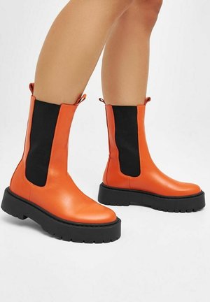 Bottines à plateau - orange