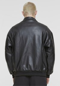 Urban Classics Faux leather jacket - black