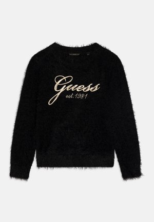 Maglione nero a maniche lunghe e peloso con "Guess est. 1981" ricamato in corsivo bianco sul petto.