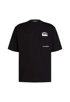 T-shirt en coton noir à manches courtes, avec un graphique blanc sur la poche poitrine et le nom de la marque "KARL LAGERFELD" en blanc.