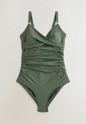Costum de baie întreg, de culoare verde închis, cu detalii pliate, bretele ajustabile și un material neted și elastic, având un croi clasic.
