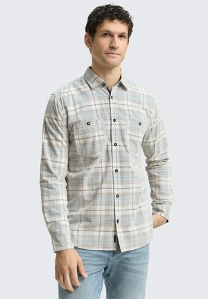 Lange mouwen geruite shirt in licht beige met blauwe en oranje tinten, voorzien van twee borstzakken, zwarte knopen en een standaard kraag.