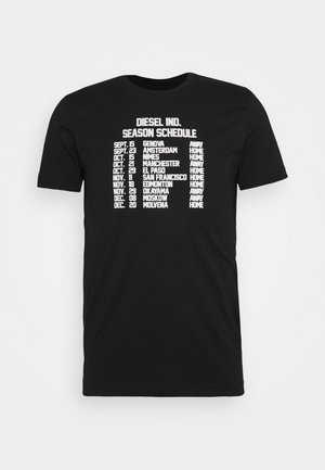 T-shirt noir avec texte blanc énumérant les dates de la saison Diesel Ind., les villes, et les lieux des matchs à domicile ou à l'extérieur en lettres majuscules grasses.