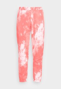 Korallfärgad tie-dye joggingbyxor med elastisk midja och ärmslut, med en mjuk tygstruktur och en minimalistisk design utan synlig branding.