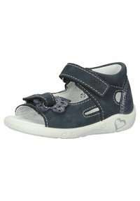 Sandalino blu navy con una fibbia in velcro, dettaglio a fiocco e accenti riflettenti. Materiale in suede morbido, design open toe e suola in gomma bianca.