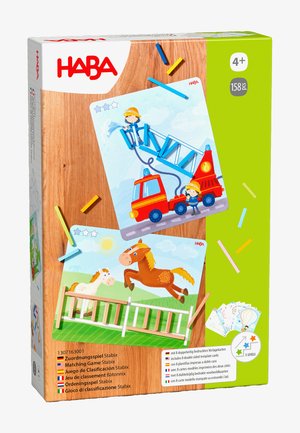 Matching game box featuring colorful illustrations of a fire truck with a ladder and a jumping horse. Bright yellow, blue, and red accents.