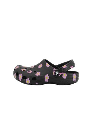 Chaussure style sabot noire avec motifs floraux roses et jaunes, trous de ventilation et bride de talon amovible.