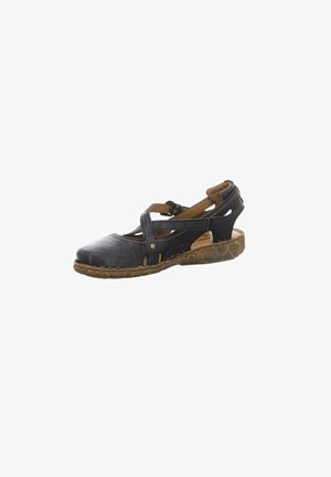 Black leather sandal with cut-out details, a rounded toe, and a low, textured wedge heel. Features adjustable straps for secure fit.
