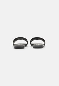 Calvin Klein Jeans FLAT SLIDE - Ciabattine - black