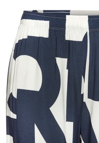 Unselected, dunkelblau weiß gemustert