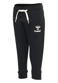 Pantalons de survêtement noirs en mélange de coton, avec un cordon blanc et un logo sur la cuisse, des poignets côtelés et des détails sur les panneaux latéraux.