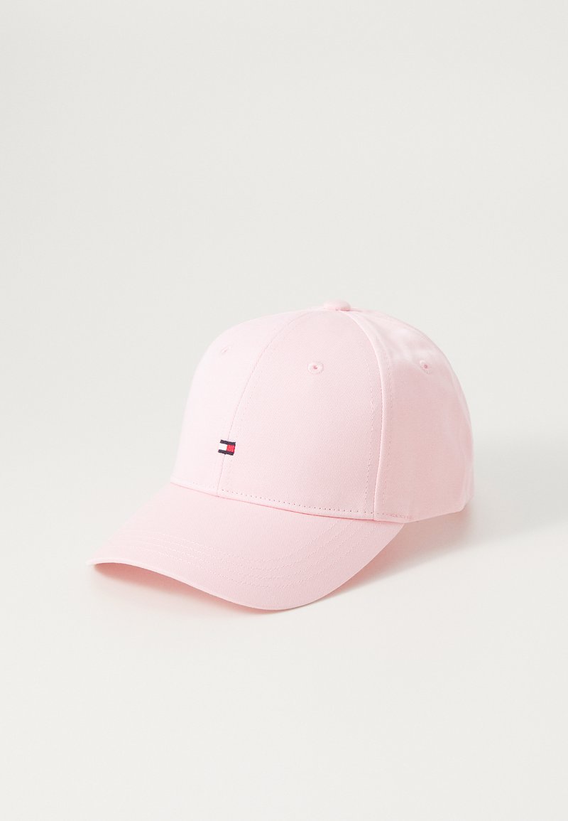 Pink baseball cap made of cotton material, featuring a curved visor and a small embroidered logo on the front. Smooth texture.