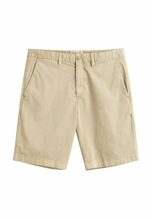 Beige katoenen heren short met riemlussen, knoopsluiting, ritssluiting en zijzakken, afgebeeld tegen een witte achtergrond.