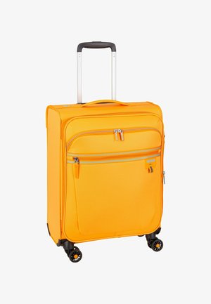 Valise souple orange vif avec poignée télescopique, poches à fermeture éclair à l'avant et quatre roues multidirectionnelles.