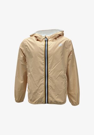 Giubbotto impermeabile beige chiaro con cappuccio, dotato di una cerniera frontale con strisce nere e bianche. Texture liscia, senza tasche né decorazioni.