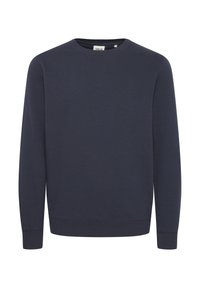 Felpa blu navy in un tessuto morbido, con collo tondo, maniche lunghe e polsini e orlo a coste per una vestibilità aderente. Design semplice, senza fantasie.