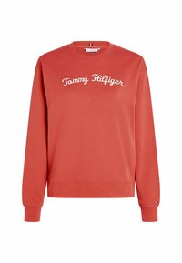 Roter Sweatshirt aus Baumwollmischung mit Rundhalsausschnitt. Mit dem "Tommy Hilfiger"-Logo in weißer Schrift über der Brust. Gerippte Bündchen und Saum.