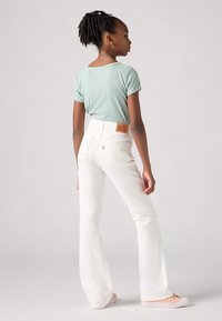 Levi's® 726 HIGH RISE FLARE  - Alt laienevad teksad - sugar swizzle