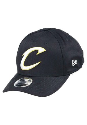 Black baseball cap with a white and yellow "C" logo on the front, featuring a curved brim and fabric texture. New Era logo on the side.