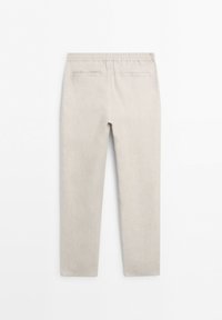 Beige straight-leg pants with an elastic waistband and two back welt pockets, shown from the rear on a white background.