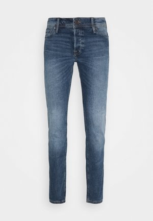 Jean en denim bleu pour homme, coupe slim, avec un effet délavé, fermeture à bouton frontal et fermeture éclair, et design à cinq poches.