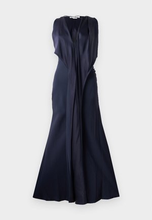 Navy blauwe mouwloze jurk met een diepe V-hals en een vloeiende silhouet; heeft gelaagd stof en drapering bij het lijfje en de taille.