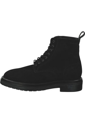 Black suede lace-up ankle boot with pull tab and thick rubber sole, side view.