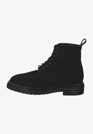 Black suede lace-up ankle boot with pull tab and thick rubber sole, side view.