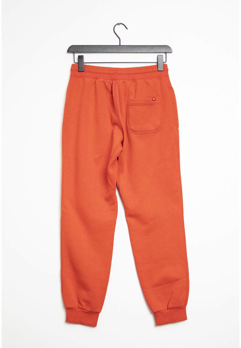 Nike Sportswear Tracksuit bottoms orange (Pre-owned)