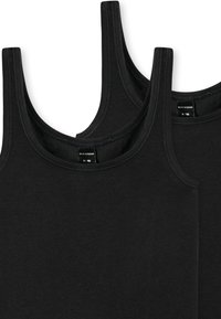 Deux débardeurs en coton noir avec de larges bretelles, des encolures rondes et des coutures visibles. Les étiquettes indiquent "SCHIESSER" et les informations de taille.