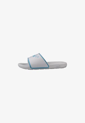 Weiß-blauer Slide-Sandalette mit profilierter Sohle und breitem Riemen mit hellblauem Blumenmuster und Puma-Logo an der Seite.