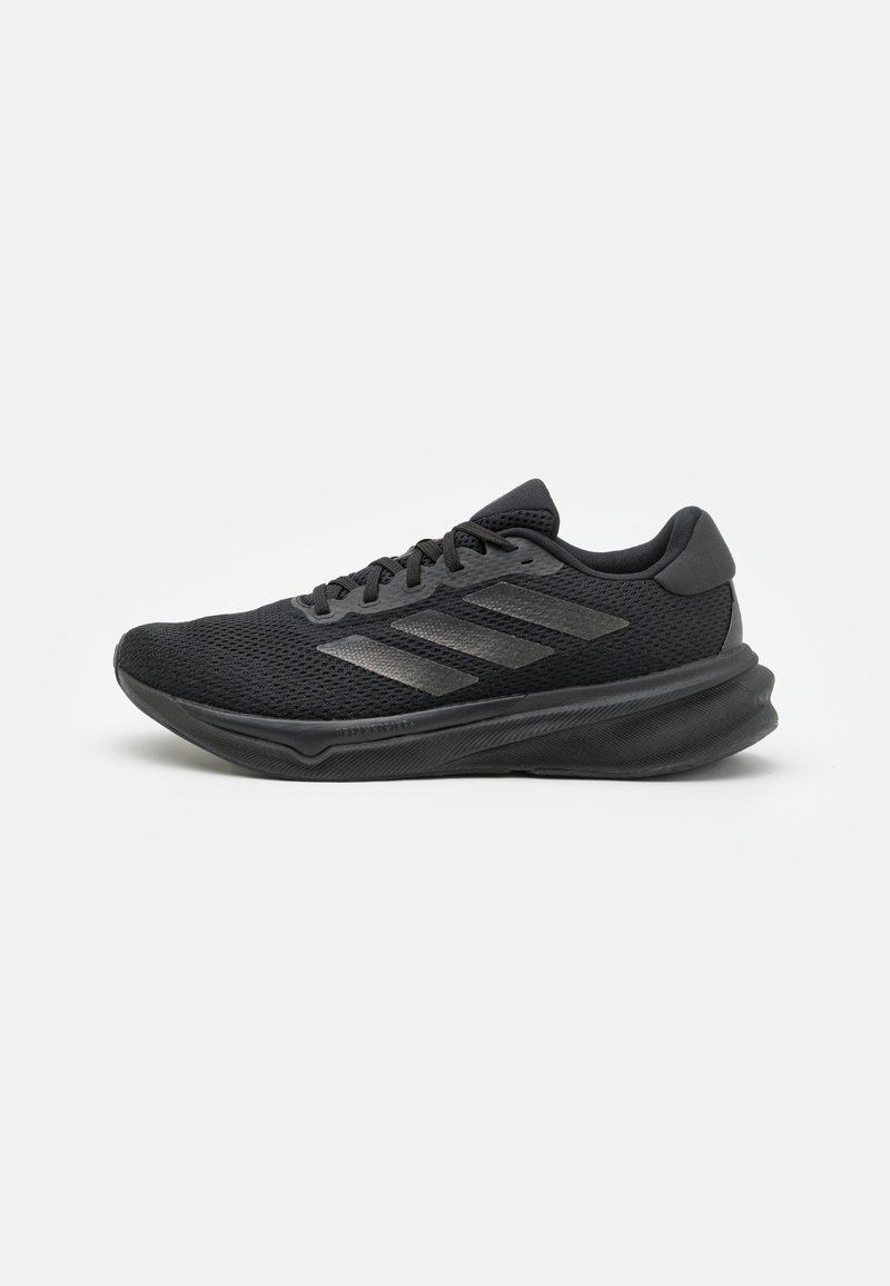 Black athletic shoes with a breathable mesh upper, textured sole, and three distinctive stripes in a darker shade on the side.