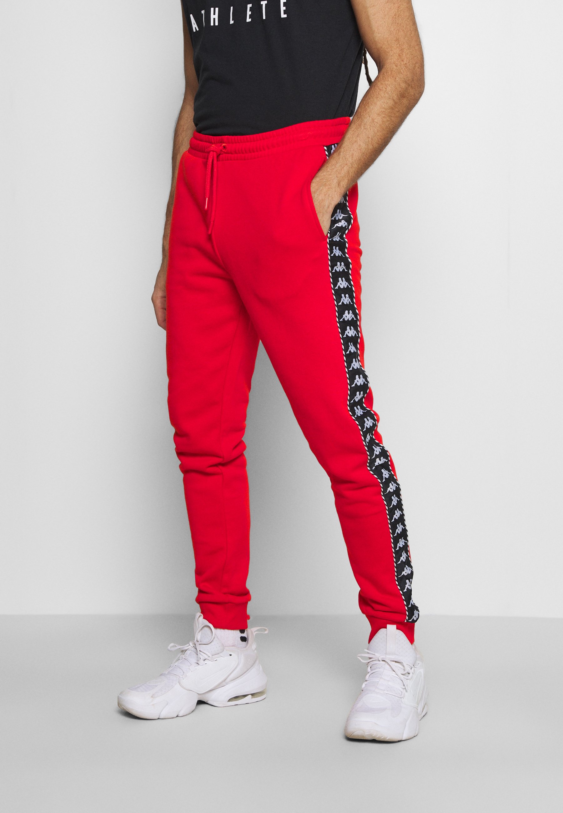 Kappa IRENVEUS - Pantaloni sportivi - firey red/rosso - Zalando.it