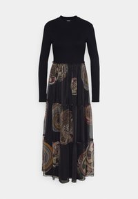 Lungo vestito nero con una parte superiore a coste e gonna fluida con motivo a spirali in tonalità terrose. Accentuato da un design a strati.