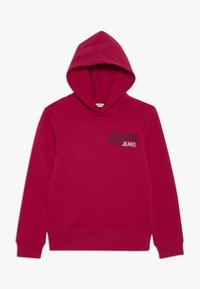 Rote Kapuzenjacke mit langen Ärmeln, gerippten Bündchen und Saum, mit dem Logo "Calvin Klein Jeans" auf der Brust.