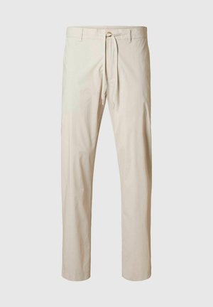 Beige trousers made of lightweight fabric, featuring an elastic waistband with a drawstring, straight legs, and smooth texture.