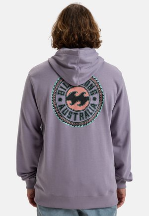 Purple hoodie with a circular graphic featuring waves and text "Billabong Australia" in contrasting colors. Cotton blend fabric, relaxed fit.