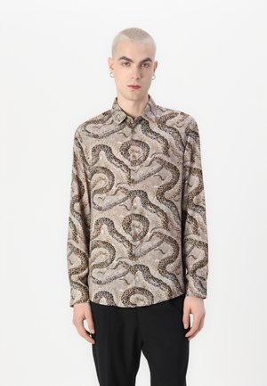 Langermet knyte skjorte i beige stoff, med slangeskinnmønster i brunt og svart, standard krage og avrundet kant.