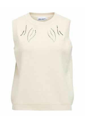 Haut sans manches en maille crème avec un col rond et des motifs découpés en forme de feuille sur la poitrine, bordures côtelées au niveau du col et de l'ourlet.